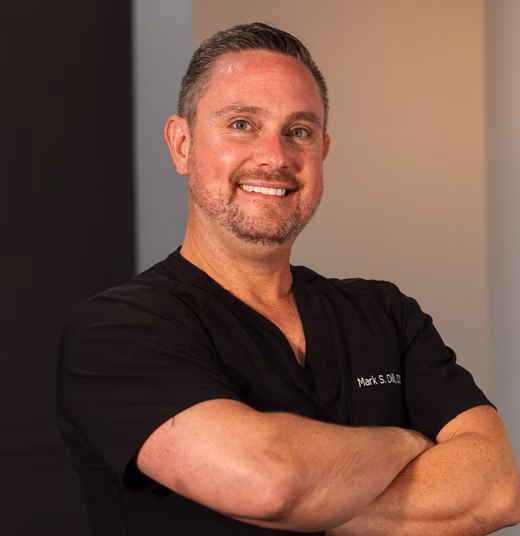 Dr. Mark Dill in scrubs